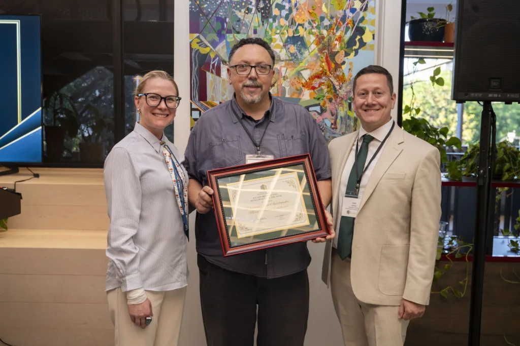 group photo with certificate